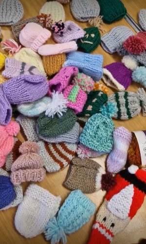 A selection of small woollen hats